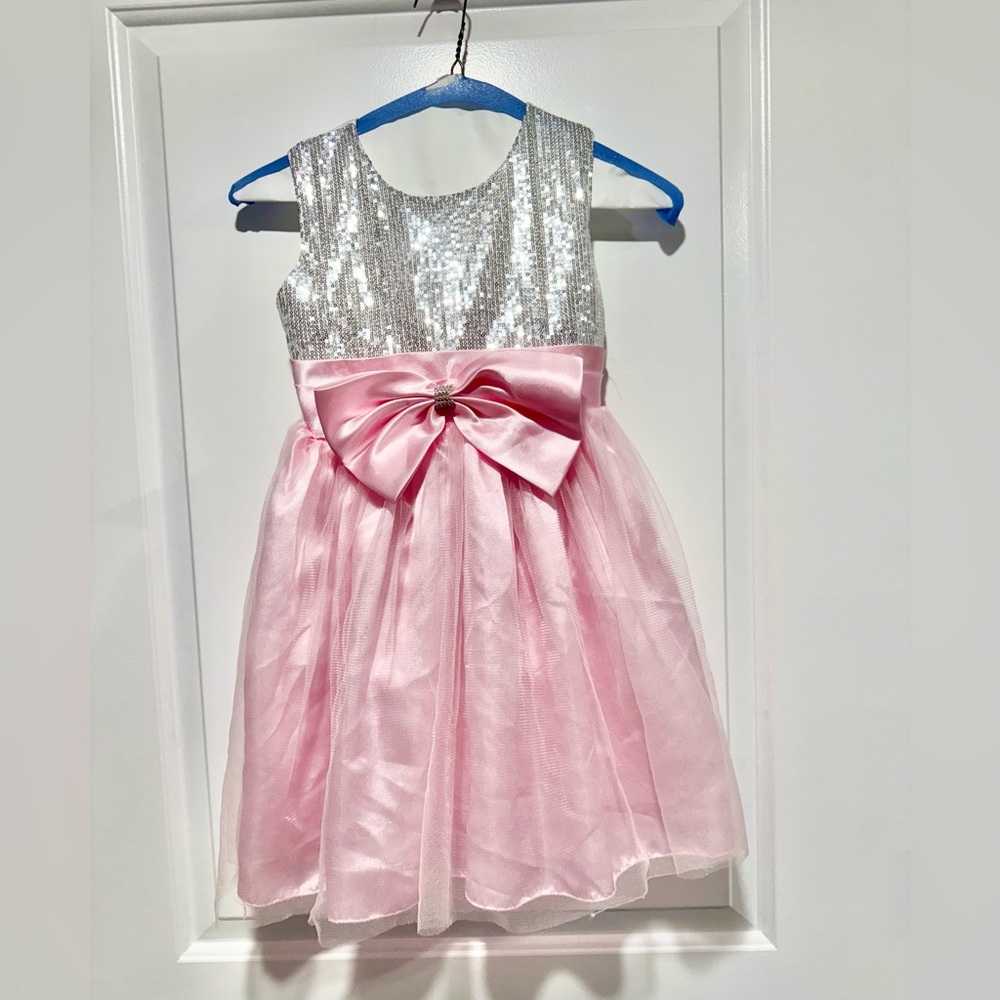 Little girls formal dress. Sequins top with tulle bottom. Under slip. Zip back